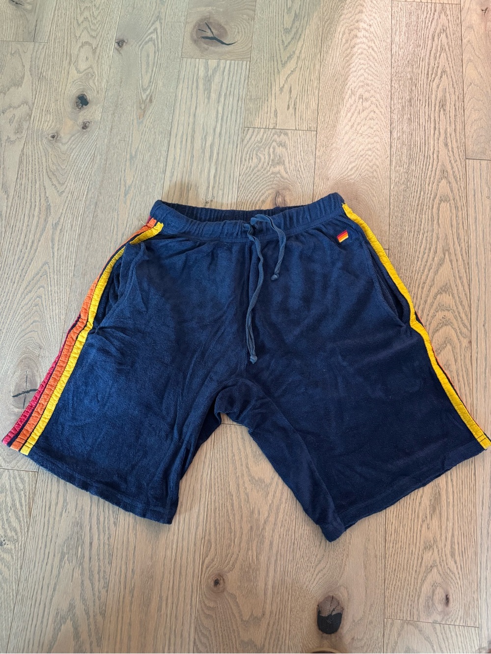 Aviator Nation Navy Terry Shorts with Red and Yellow Side Stripes